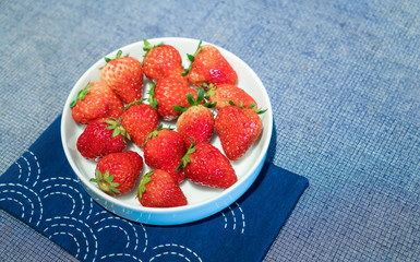 Strawberry in white porcelain dish