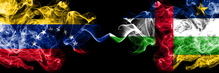 Venezuela vs Central African Republic smoky mystic flags placed side by side. Thick colored silky smoke flags of Venezuela and Central African Republic