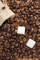 Coffee beans and sugar cubes