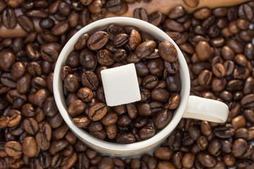 Coffee beans and sugar cubes
