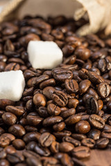Coffee beans and sugar cubes
