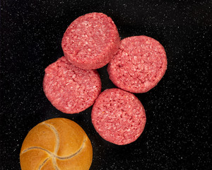 Raw Angus Beef Burger Patties and Bun