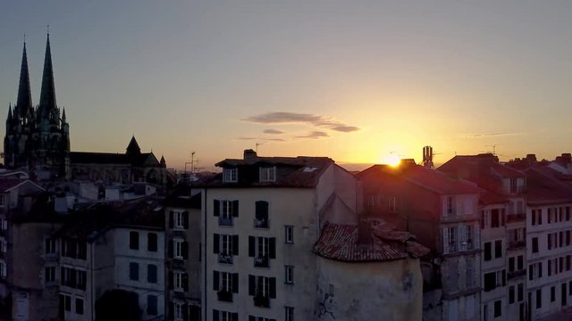 Bayonne France flying over the Roman tower that was also part of the medieval city walls and now is a private house aerial view at sunrise