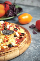 Slice of hot pizza large cheese lunch or dinner crust seafood meat topping sauce. with bell pepper vegetables delicious tasty fast food italian traditional on wooden board table classic in view