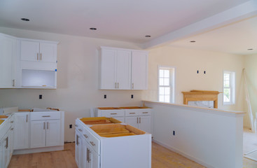 Blind cabinet island drawers and counter cabinets installed of white color