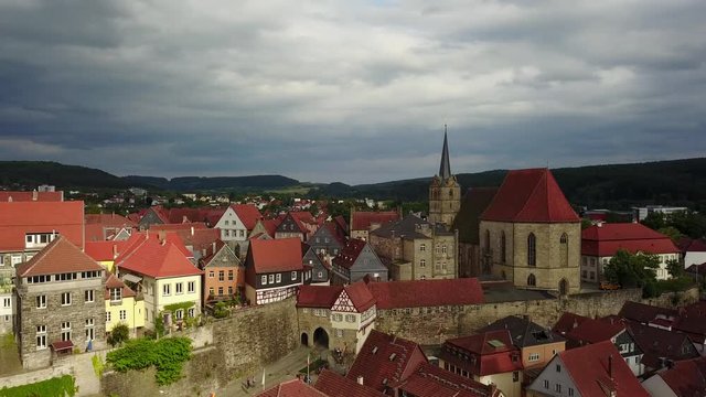 Kronach medieval walled town and castle with red roofs and historic houses in Franconia, Bavaria Germany with dramatic stormy sky on a summer afternoon