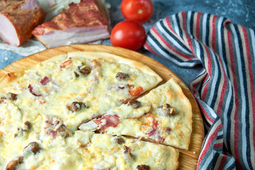 Slice of hot pizza large cheese lunch or dinner crust seafood meat topping sauce. with bell pepper...