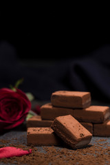 Chocolates and roses on the table