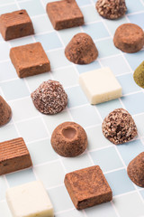 Chocolates and roses on the table