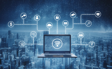 Computer laptop with wireless and application programming and social media icons. Internet...