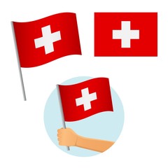 Switzerland flag in hand