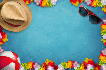 Holidays background with shells and attributes of summer