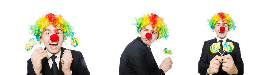 Clown with lollipop isolated on white