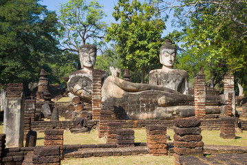 Ancient sculpture composition on the ruins of a Buddhist temple Wat Phra Kaeo. Kamphaeng Phet, Thailand