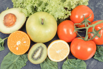 Ripe fruits with vegetables as healthy nutritious snack containing vitamins