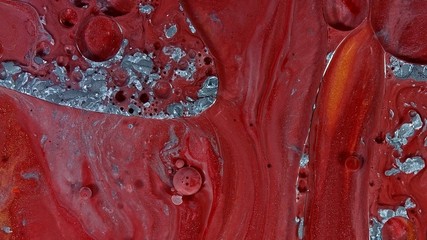 red silver striking paint abstract