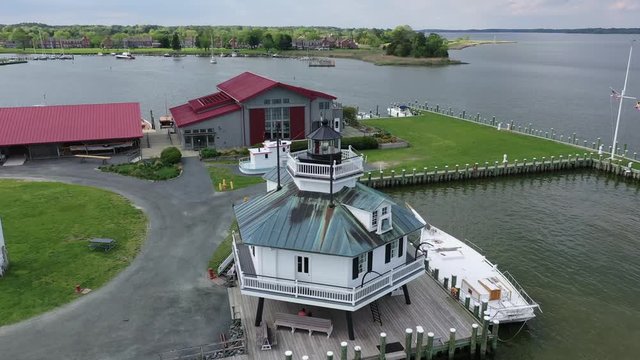Aerial footage of the wooden historic lighthouse on the Chesapeake Bay in St. Micheals Maryland USA