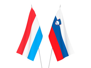 National fabric flags of Slovenia and Luxembourg isolated on white background. 3d rendering illustration.