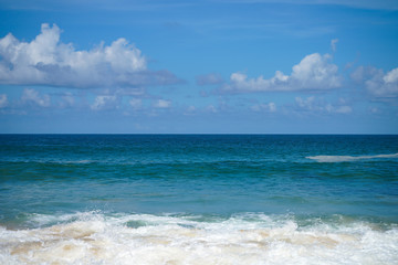 Clouds blue sky and calm sea background landscape