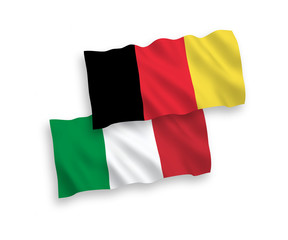 National vector fabric wave flags of Italy and Belgium isolated on white background. 1 to 2 proportion.
