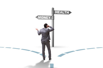 Businessman choosing between money and health