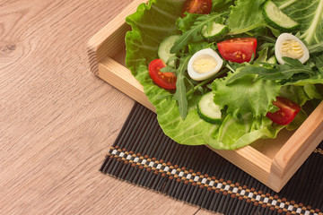 Salad.Cherry Tomatoes and Boiled Egg Salad.Home made food.Concept for a tasty and healthy meal