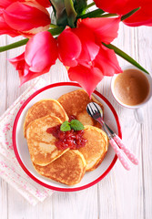 Pancakes with  jam served on plate