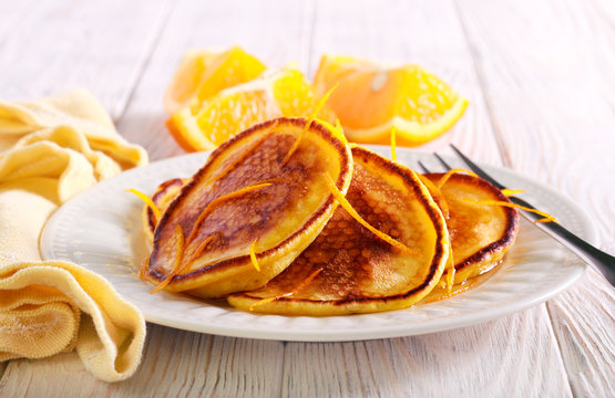 Orange Scotch Pancakes Served On Plate