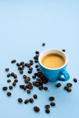 Blue espresso cup on blue