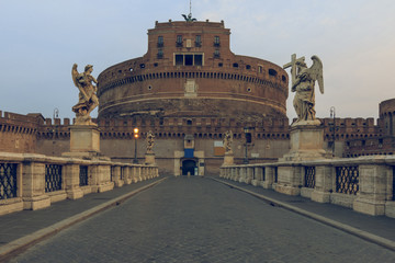 Stone bridge to Castle Sant Angelo in the morning at dawn without people. Aurelius bridge with...