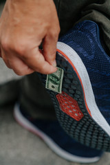 Banknote stuck to sole