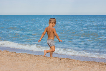 boy, sea, beach, water, little, summer, sand, swim, child, young, swimming, nature, kid, lifestyle, ocean, family, vacation, people, happy, fun, blue, leisure, sun, play, travel