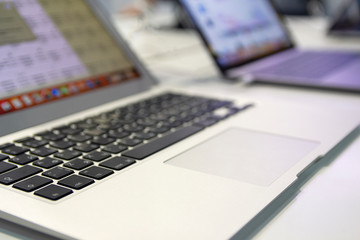 Variety of laptops in the storefront electronics store