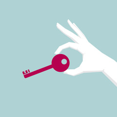 Take the key in hand. Isolated on blue background.