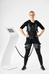 cheerful fit girl is ready for fitness training. slim woman . preventing injuries with modern...