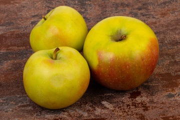 Ripe apples over background