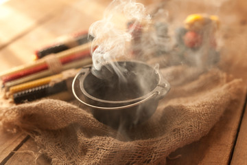 Witches pot with burning herbs