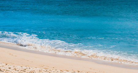 white sand beach and clean blue sea