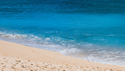 white sand beach and clean blue sea