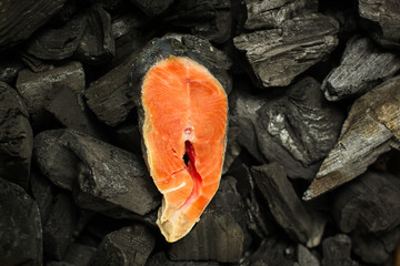 salmon, red fish piece raw fillet (fresh seafood). food background. top