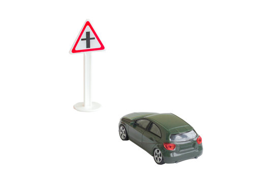Road sign and car. Showing the traffic situation for children
