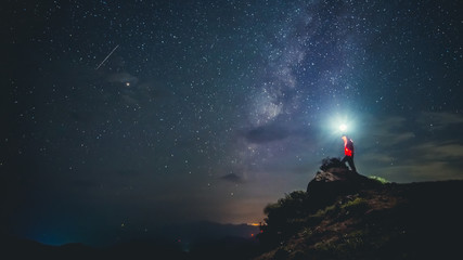 Adventure, night, travel, people on the top of the mountain