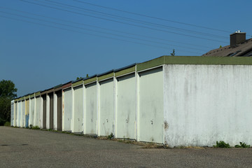 A number of garages located on the outskirts of the city