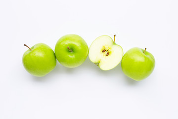 Green apples on white