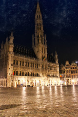 Fototapeta na wymiar Grand Place in Brussels Belgium by night with star