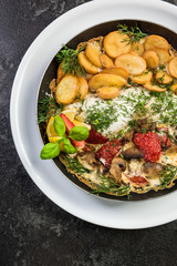 Grilled fish with fried potatoes, restaurant serving dish
