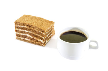 Fototapeta na wymiar piece of cake and a cup of coffee on a white background