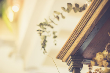 Obraz premium Shelf with flowers. vintage background concept.