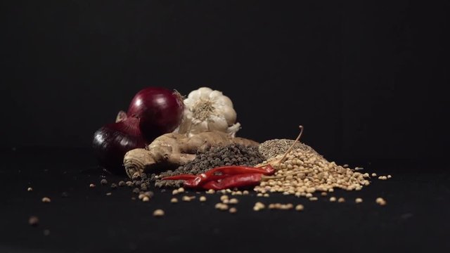 Common delicious Indian spice seeds in a big pile. Vegetable, cooking, decoration concept. Slow motion and close-up view.