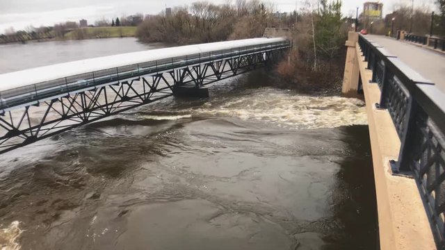 Wide angle shot of the rapids of the Ottawa River during the 2019 Ottawa flood.